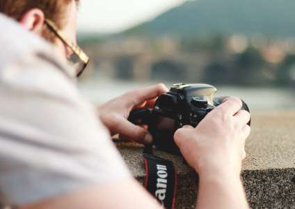 человек с фотоаппаратом