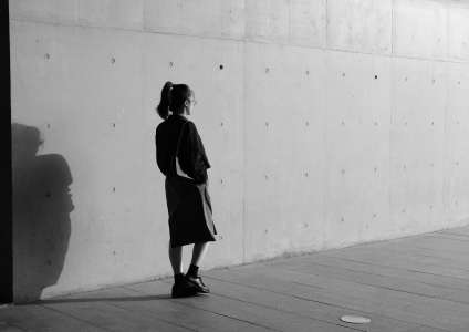 The girl is walking.